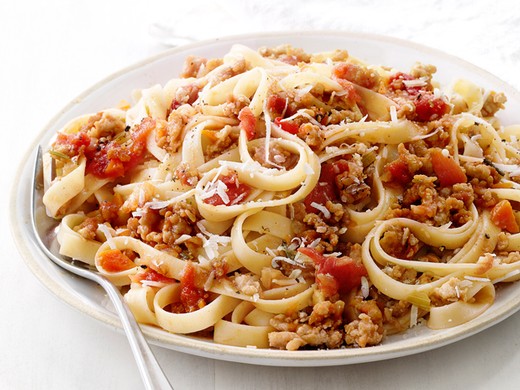 Lamb Sausage Ragout with Mushrooms over Fettuccine